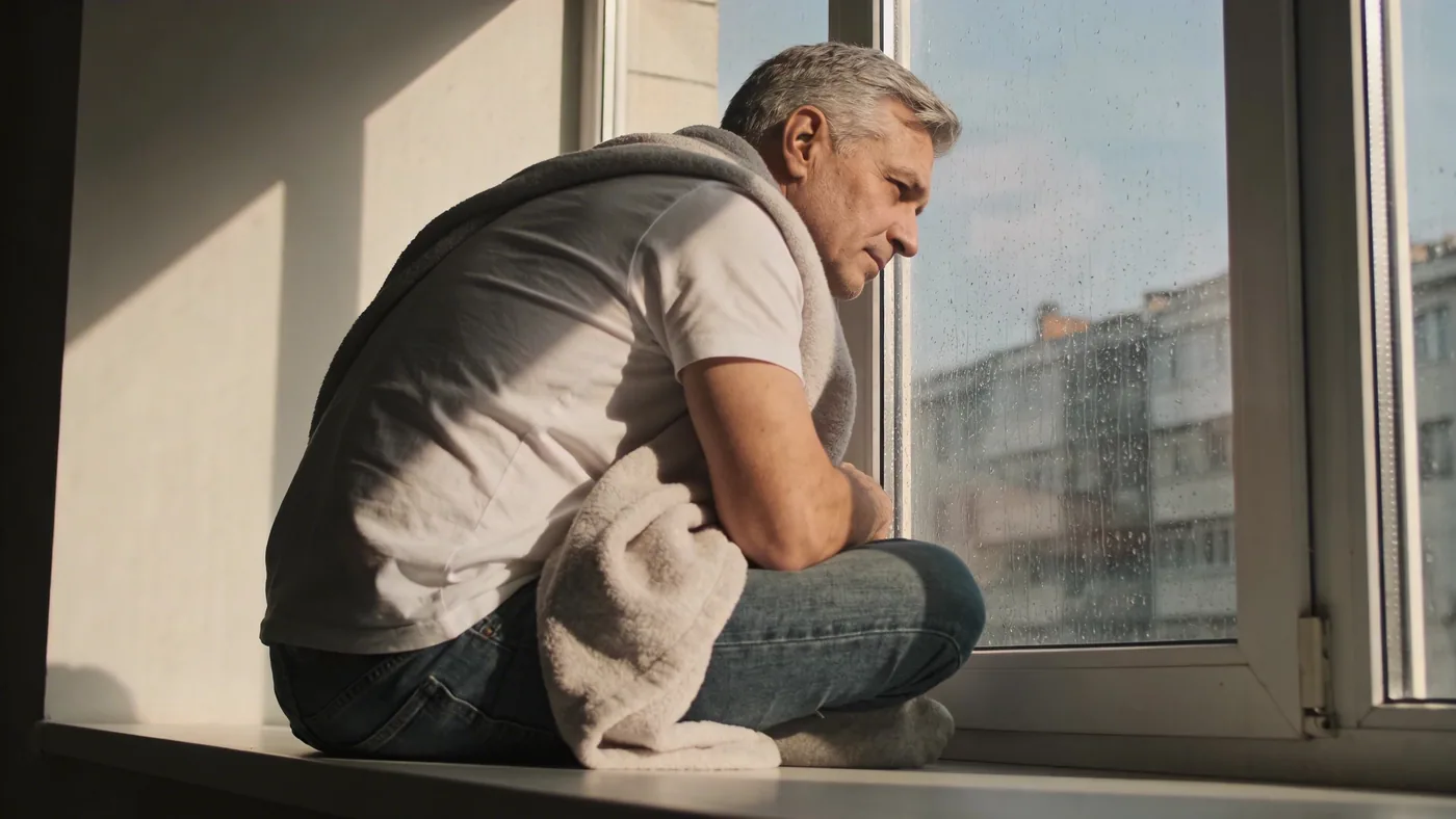 Body awareness: person in a quiet moment of stillness and emotional recognition — emotional boundaries