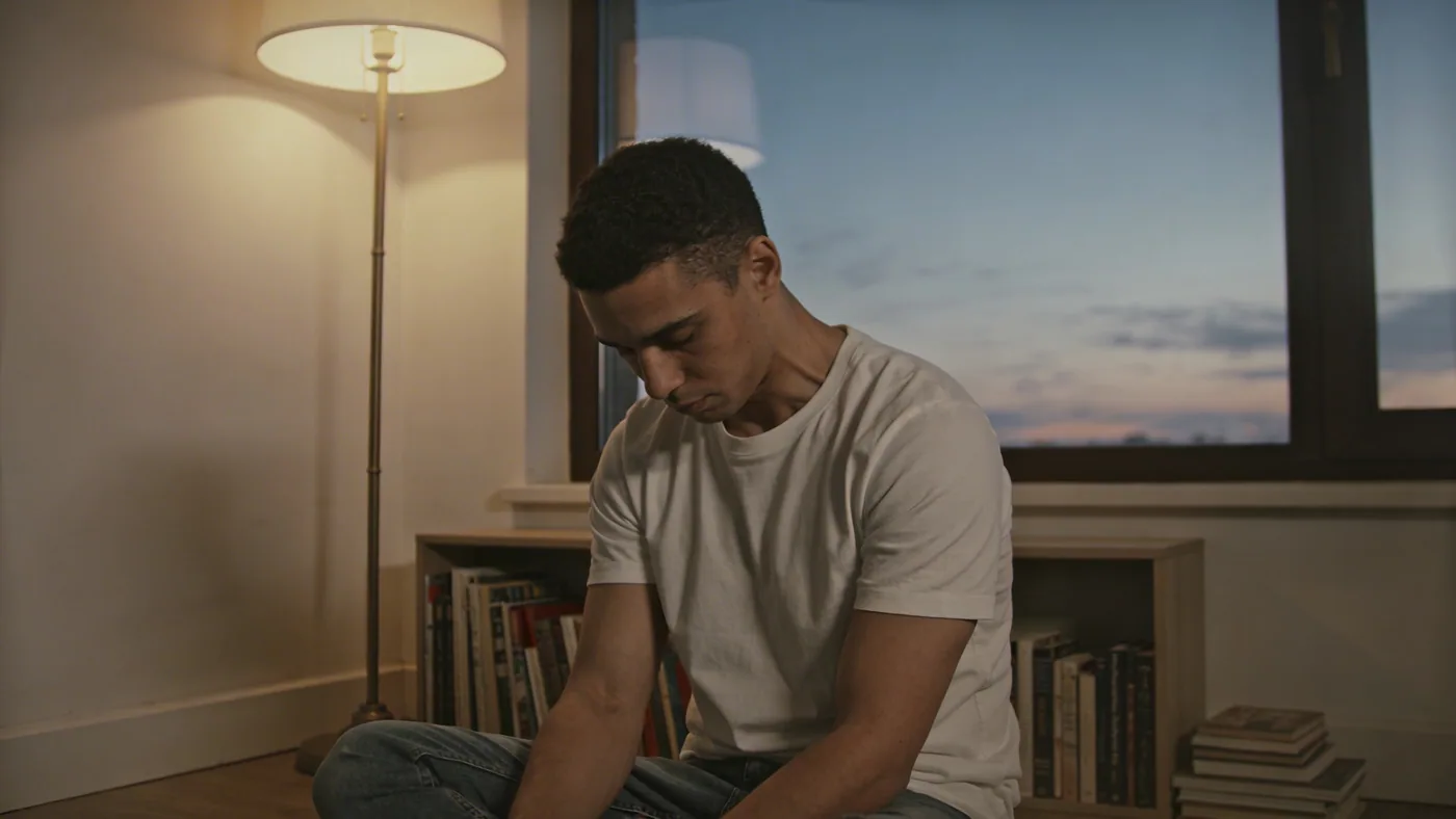 Close-up of tense neck and shoulder muscles showing body tension that yoga somatic addresses