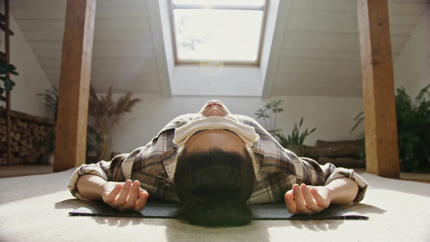 Integration: person in a quiet moment of stillness and emotional recognition — What changes after practice what softens what stays true — self-compassion meditation