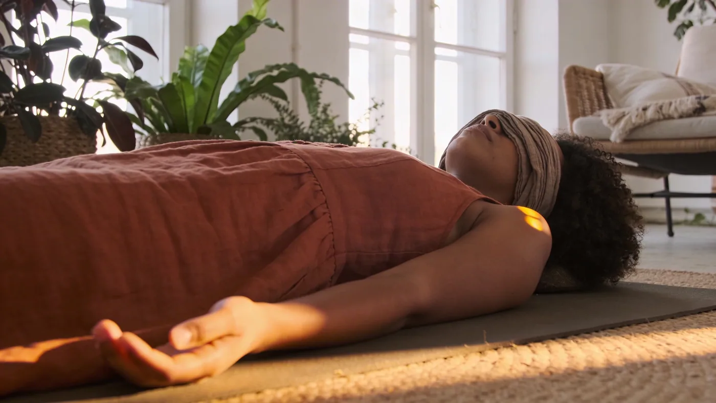 Practice moment: person walking toward warm light through a doorway — A grounded practice for tonight when you feel like an outsid — feeling disconnected from myself