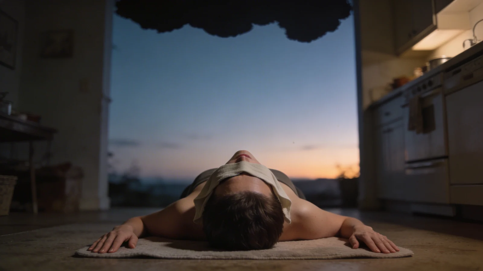 Woman standing alone in kitchen at dawn contemplating what is the dark night of the soul Woman standing alone in kitchen at dawn contemplating what is the dark night of the soul