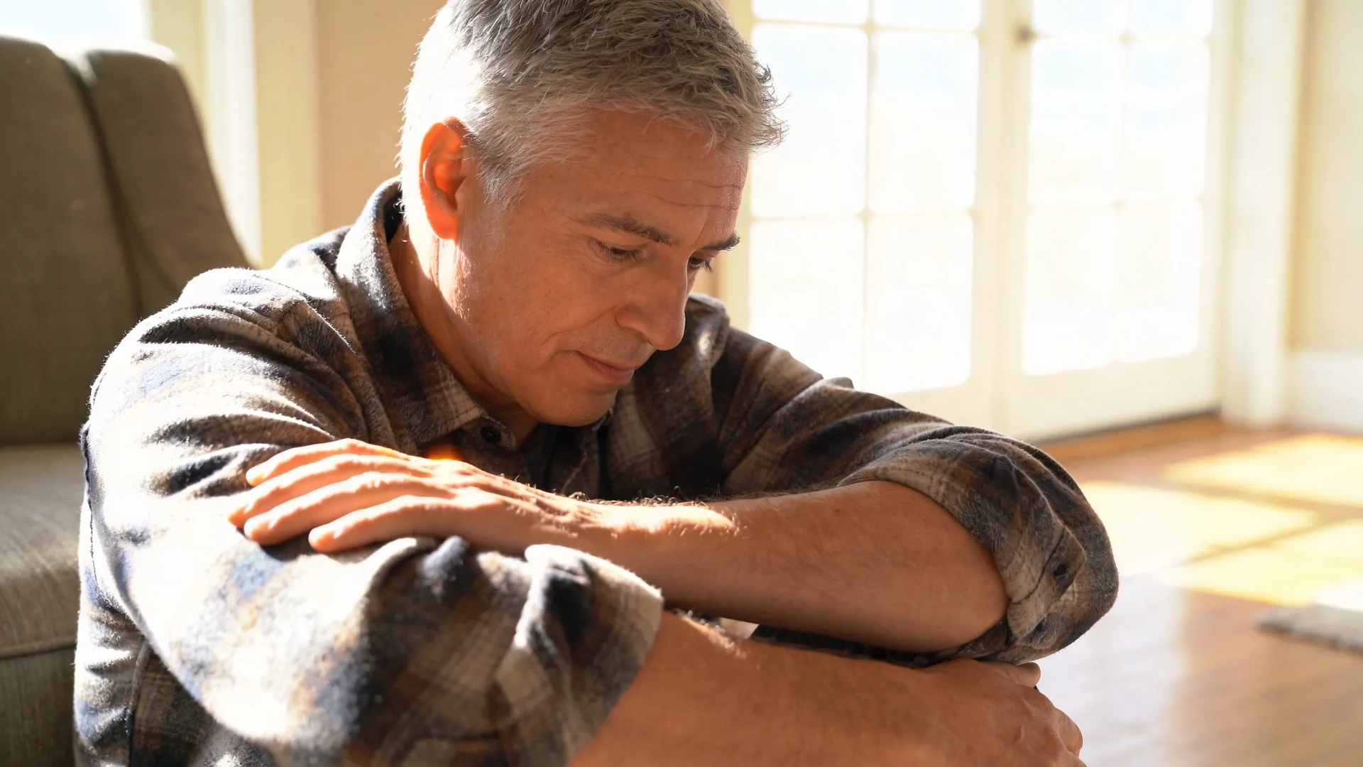 Man touching his neck in office corridor using a cleaner filter for live decision moments