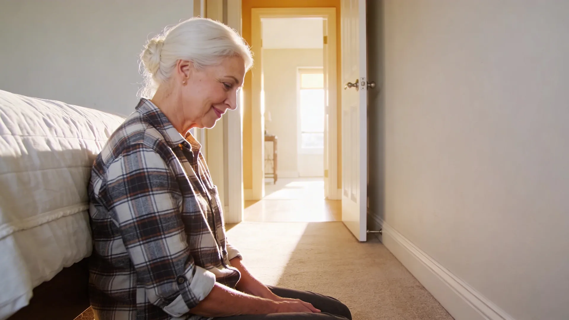 Sunlit open door at end of corridor with warm light symbolizing why feel your feelings matters