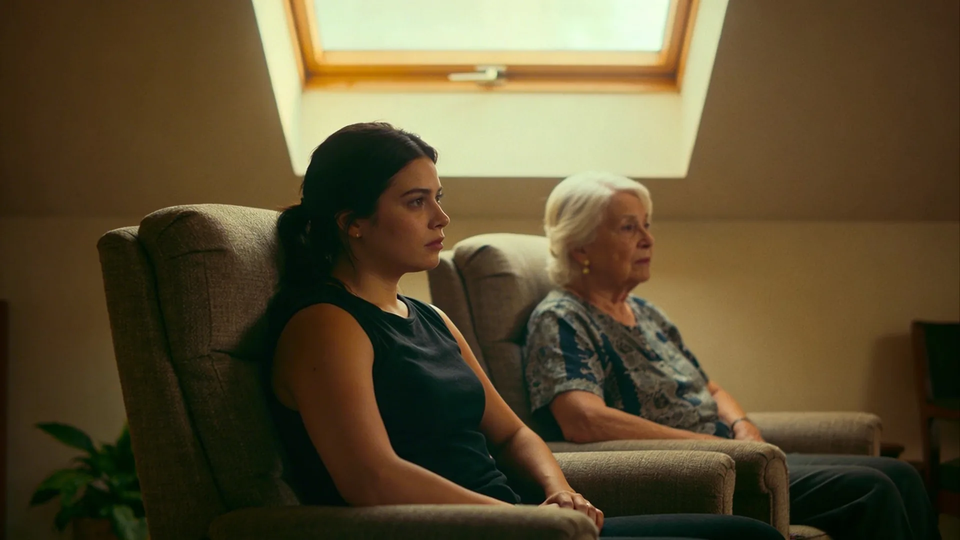 Two people sitting quietly on a sofa when feeling like a burden stops being a thought and becomes identity