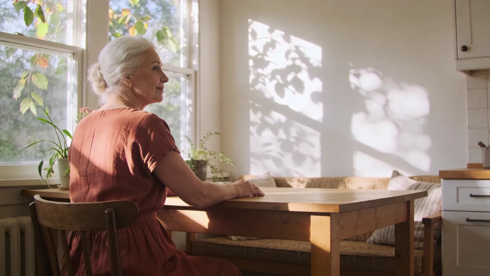 Hands resting on wooden kitchen table showing how to create emotional safety through grounded presence