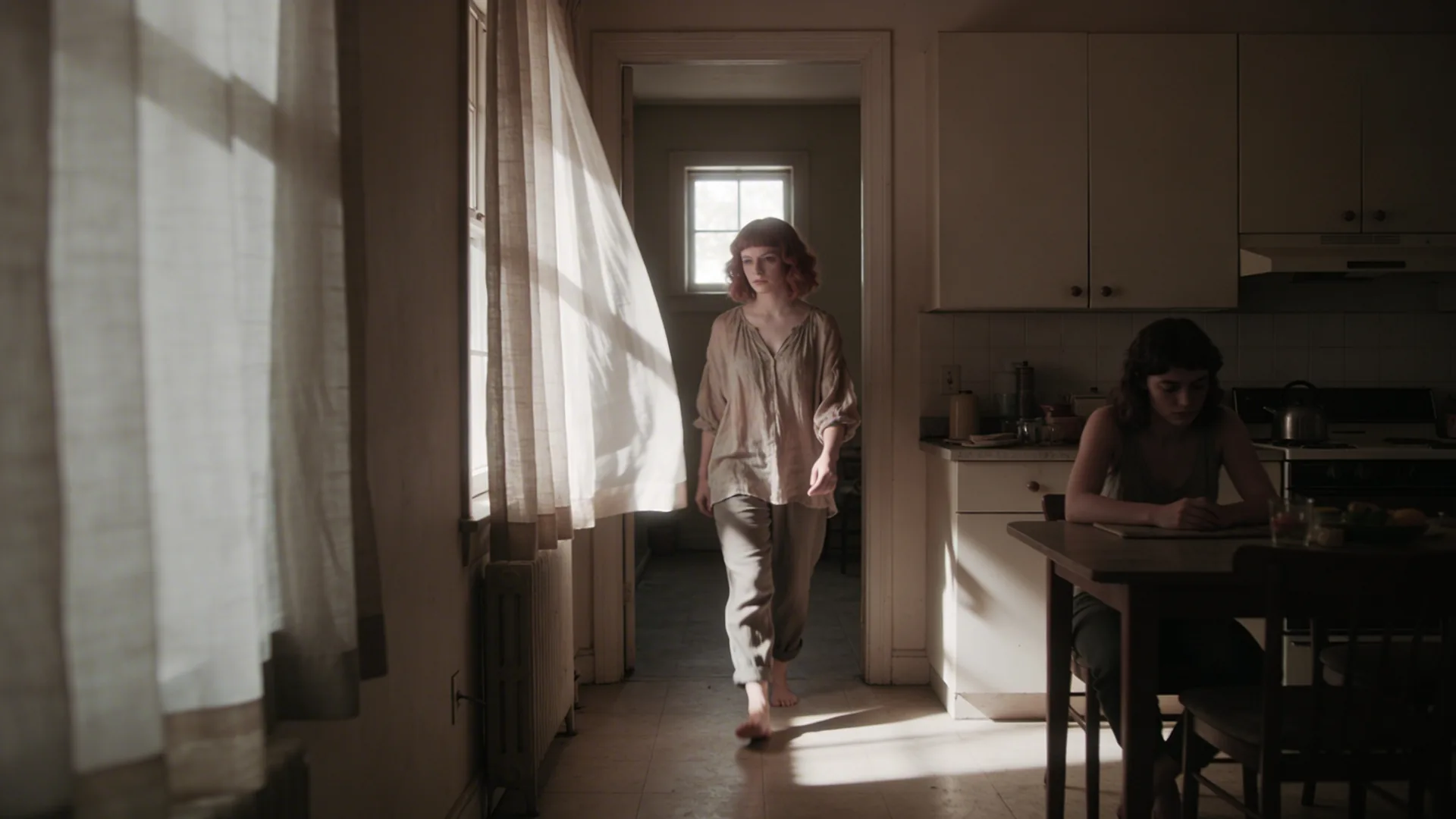 Woman sitting quietly at a kitchen table in morning light, feeling what is underneath guilt in still domestic space