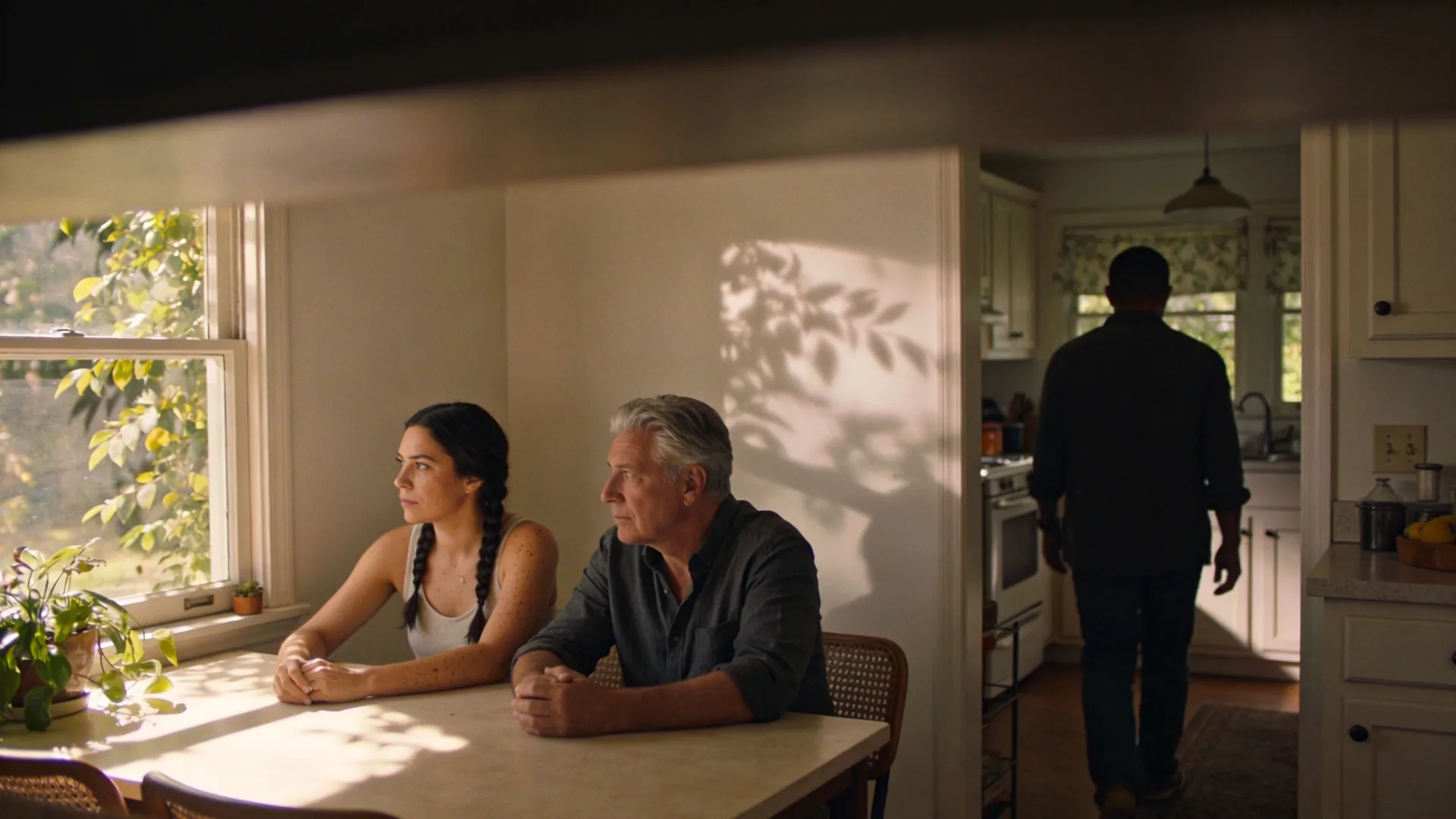 Person walking slowly through kitchen during a 3-minute reset for the moment about to snap